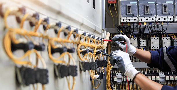 Professional Electrician technician working in West Des Moines, IA